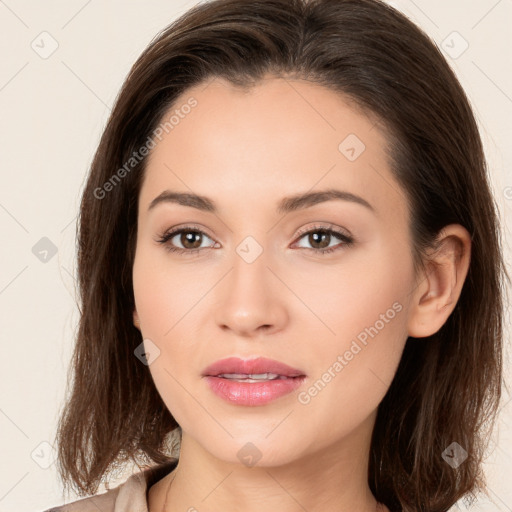 Neutral white young-adult female with long  brown hair and brown eyes