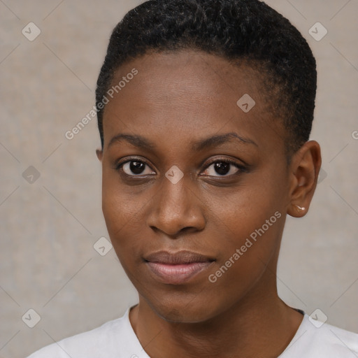 Joyful black young-adult female with short  black hair and brown eyes