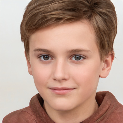 Joyful white child female with short  brown hair and grey eyes