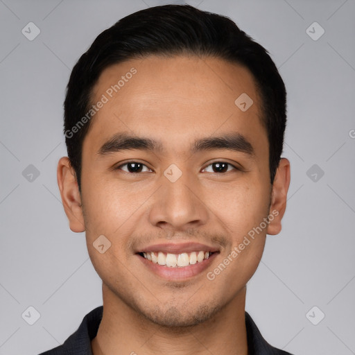 Joyful white young-adult male with short  black hair and brown eyes