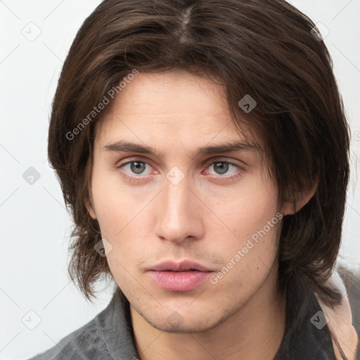 Neutral white young-adult male with medium  brown hair and brown eyes