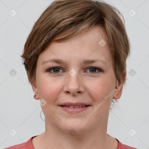 Joyful white young-adult female with short  brown hair and grey eyes