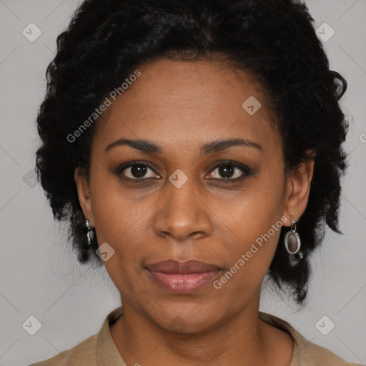 Joyful latino adult female with short  black hair and brown eyes