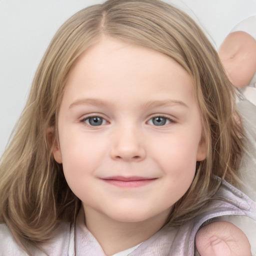 Joyful white child female with medium  brown hair and blue eyes