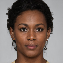 Neutral black young-adult female with short  brown hair and brown eyes