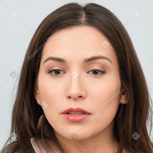 Neutral white young-adult female with long  brown hair and brown eyes