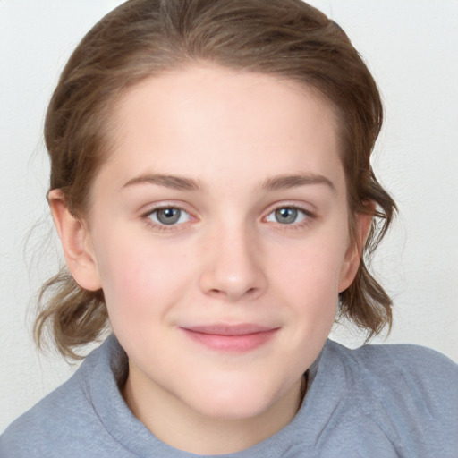 Joyful white child female with medium  brown hair and grey eyes