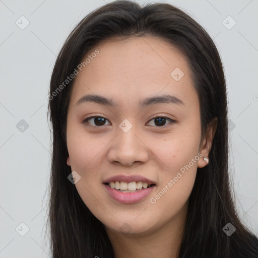 Joyful asian young-adult female with long  brown hair and brown eyes