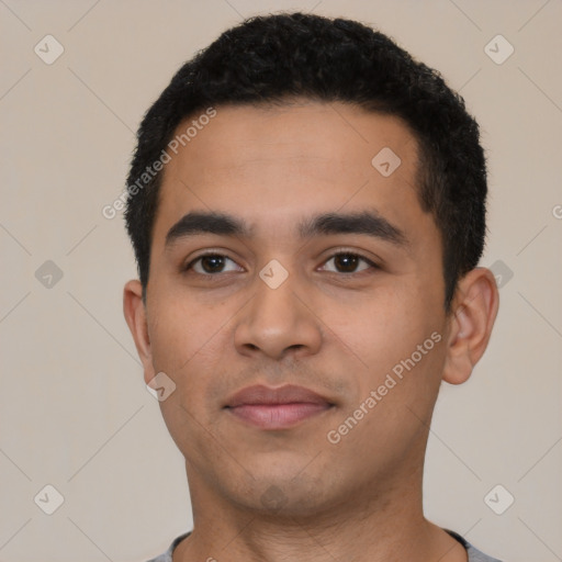 Neutral latino young-adult male with short  black hair and brown eyes