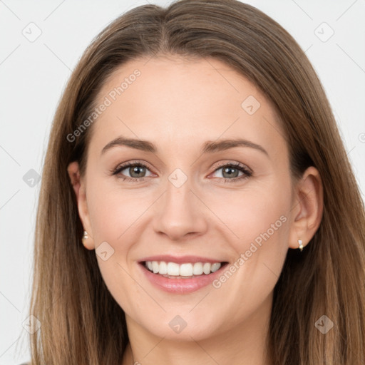 Joyful white young-adult female with long  brown hair and grey eyes