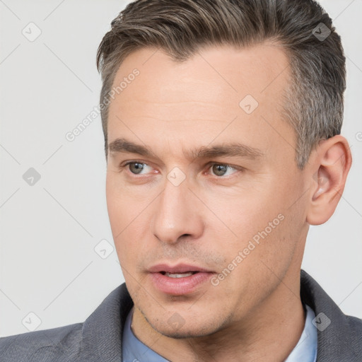 Neutral white adult male with short  brown hair and brown eyes