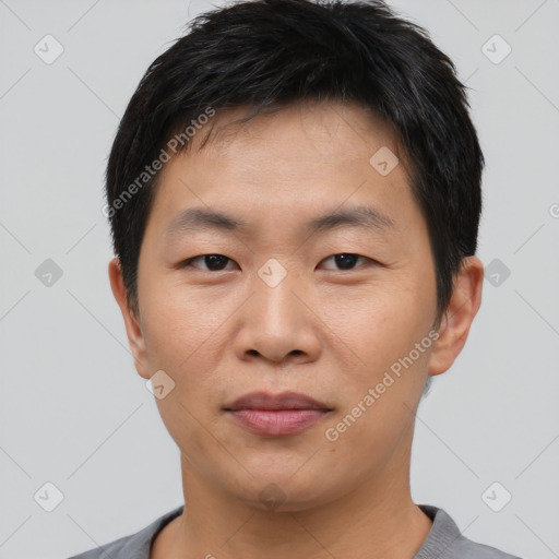 Neutral asian young-adult male with short  black hair and brown eyes