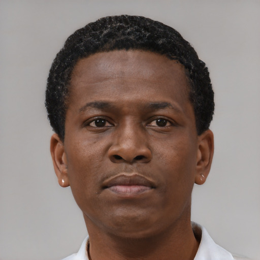 Neutral black young-adult male with short  brown hair and brown eyes