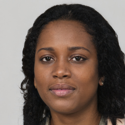 Neutral black young-adult female with long  black hair and brown eyes