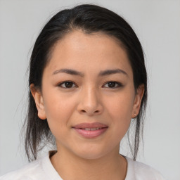 Joyful asian young-adult female with medium  brown hair and brown eyes