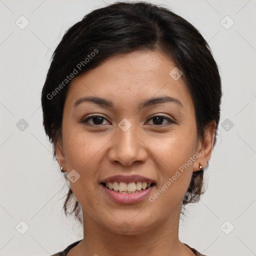 Joyful latino young-adult female with medium  brown hair and brown eyes