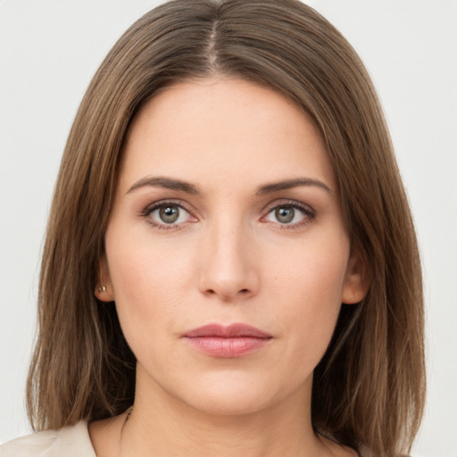 Neutral white young-adult female with medium  brown hair and grey eyes