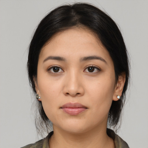 Neutral asian young-adult female with medium  black hair and brown eyes