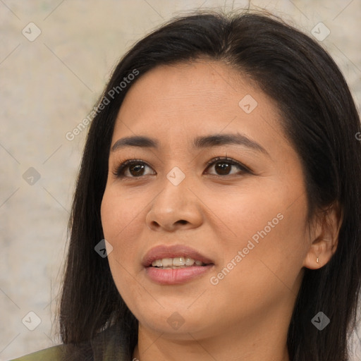 Joyful asian young-adult female with long  brown hair and brown eyes