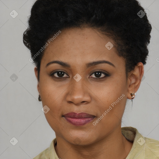 Joyful black young-adult female with short  brown hair and brown eyes