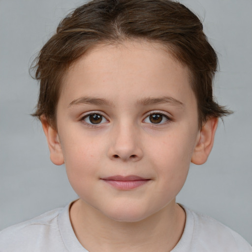 Joyful white child female with short  brown hair and brown eyes