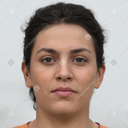 Neutral white young-adult female with short  brown hair and brown eyes