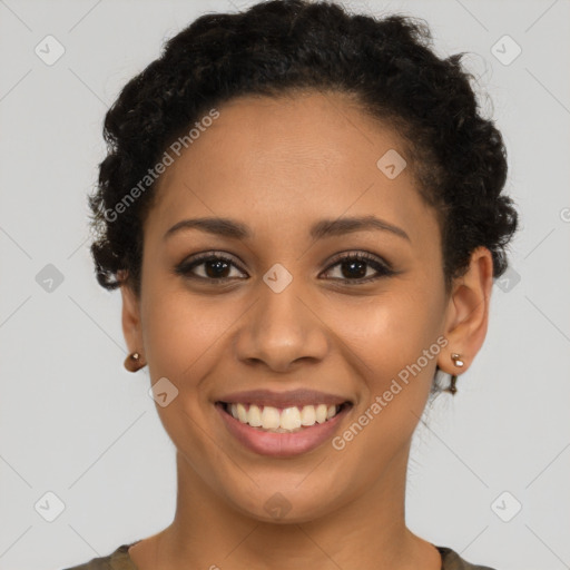 Joyful latino young-adult female with short  brown hair and brown eyes