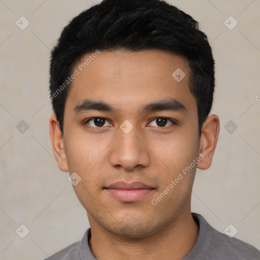 Neutral latino young-adult male with short  black hair and brown eyes