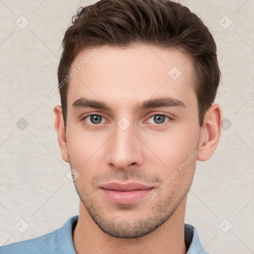 Neutral white young-adult male with short  brown hair and brown eyes