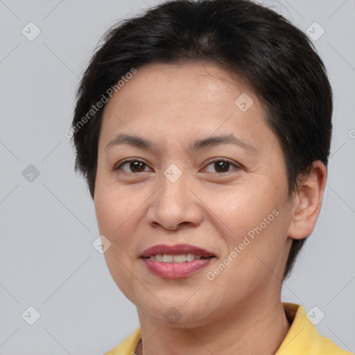 Joyful white adult female with short  brown hair and brown eyes