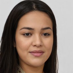 Joyful asian young-adult female with long  brown hair and brown eyes