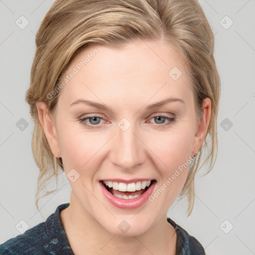 Joyful white young-adult female with medium  brown hair and blue eyes