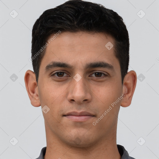 Neutral white young-adult male with short  black hair and brown eyes