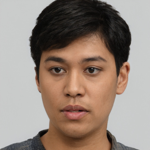 Neutral asian young-adult male with short  black hair and brown eyes