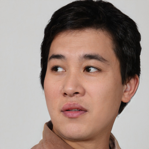 Neutral asian young-adult male with short  black hair and brown eyes