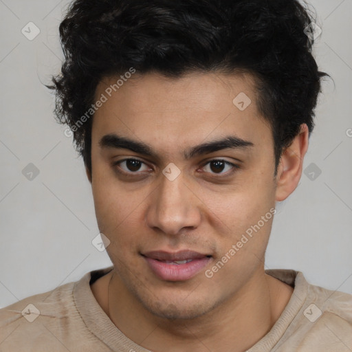 Joyful latino young-adult male with short  brown hair and brown eyes