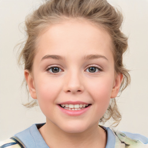 Joyful white child female with medium  brown hair and grey eyes