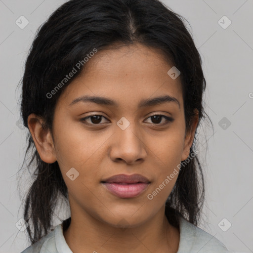 Joyful latino young-adult female with medium  brown hair and brown eyes