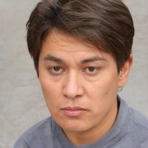 Neutral white adult male with short  brown hair and brown eyes