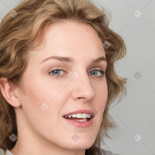 Joyful white young-adult female with medium  brown hair and blue eyes