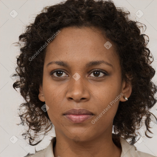 Neutral black young-adult female with long  brown hair and brown eyes