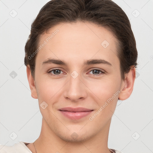 Joyful white young-adult female with short  brown hair and brown eyes