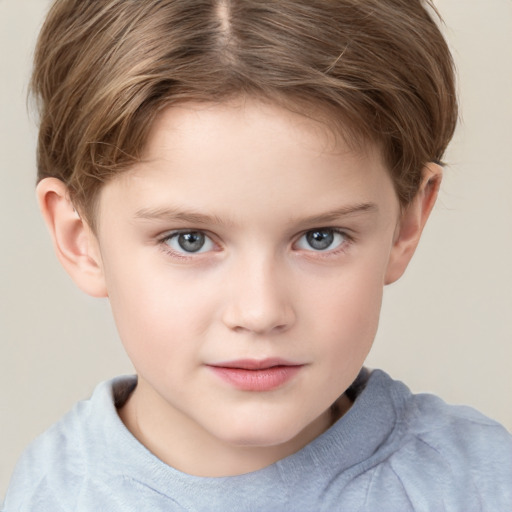 Joyful white child female with short  brown hair and grey eyes