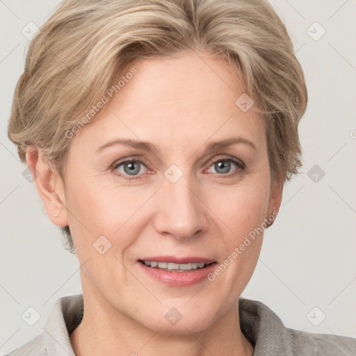 Joyful white adult female with short  brown hair and grey eyes