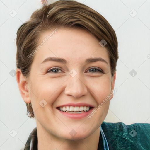 Joyful white young-adult female with short  brown hair and grey eyes