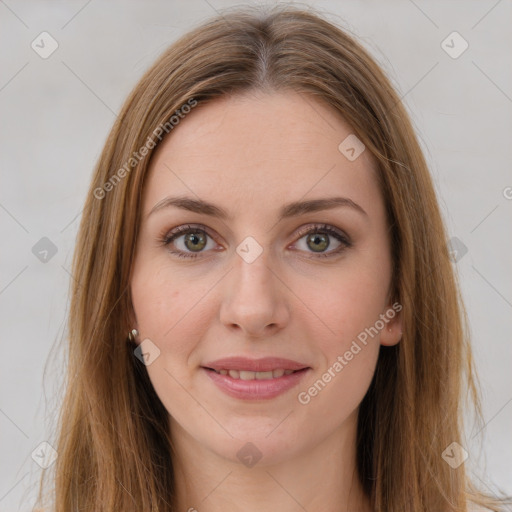 Joyful white young-adult female with long  brown hair and green eyes