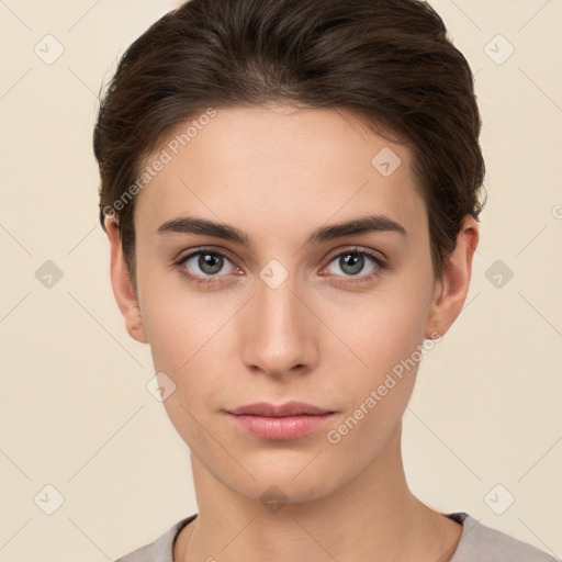 Neutral white young-adult female with short  brown hair and brown eyes