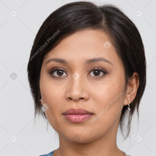 Joyful asian young-adult female with medium  brown hair and brown eyes