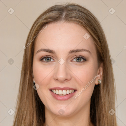 Joyful white young-adult female with long  brown hair and green eyes