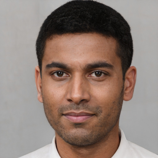 Neutral latino young-adult male with short  black hair and brown eyes